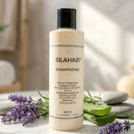 Flacon Silahair Shampooing entouré de lavande et pierre, ambiance spa wellness