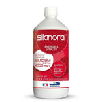 Bouteille Silanoral en verre avec étiquette rouge sur fond blanc