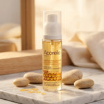 Spray anti poils incarnés bio Acorelle sur marbre blanc avec éléments naturels