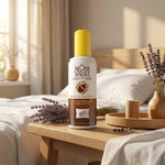 Spray anti punaise de lit Aromaspray sur table de nuit avec linges blancs