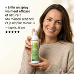 Femme tenant spray assainissant bio Pranarom Orange Ravintsara avec témoignage client 5 étoiles