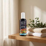 Spray d'ambiance Girofle Camphre sur étagère salle de bain avec serviettes et eucalyptus frais