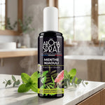 Spray d'ambiance Menthe Niaouli dans salle de bain avec feuilles de menthe fraîche et eucalyptus