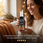 Femme tenant spray d'ambiance Thym Cannelle Aromaspray avec avis 5 étoiles en décor automnal