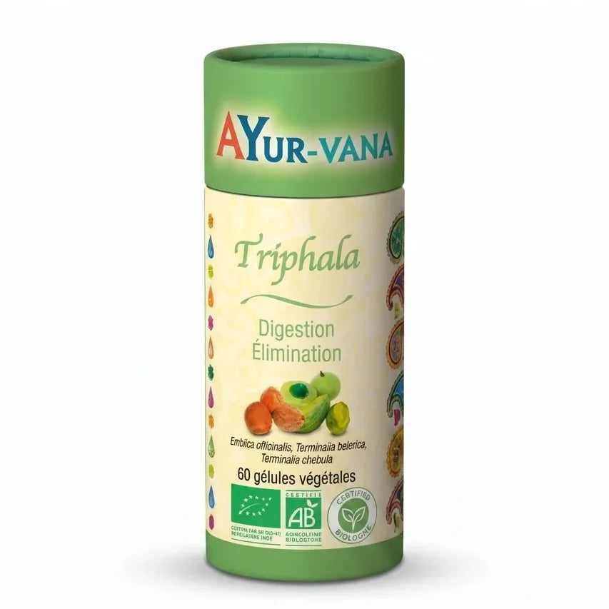 Triphala bio vegan en gélules Ayurvana, flacon vert et crème sur fond blanc